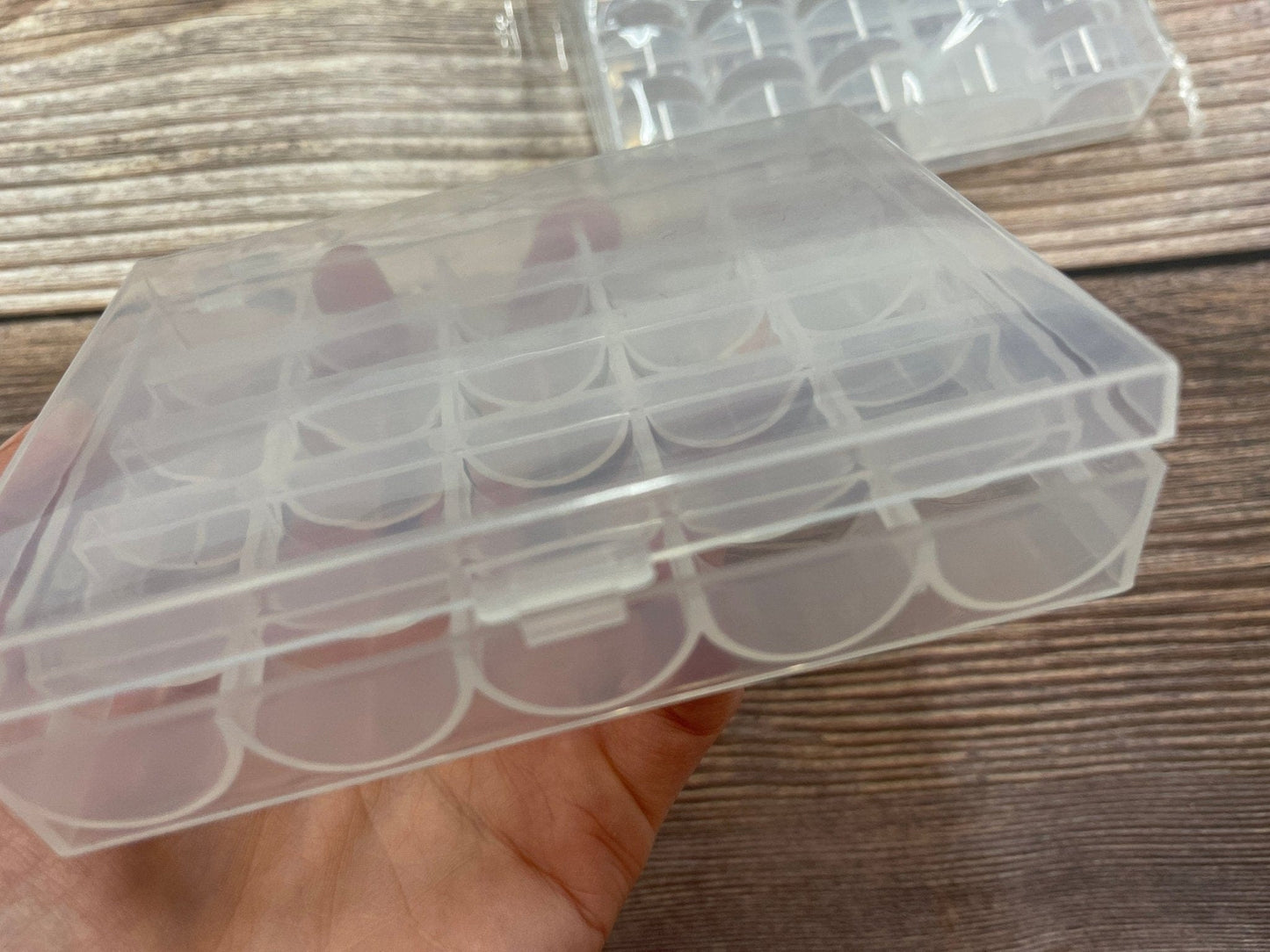 Boîte en plastique pour ranger des bobines
