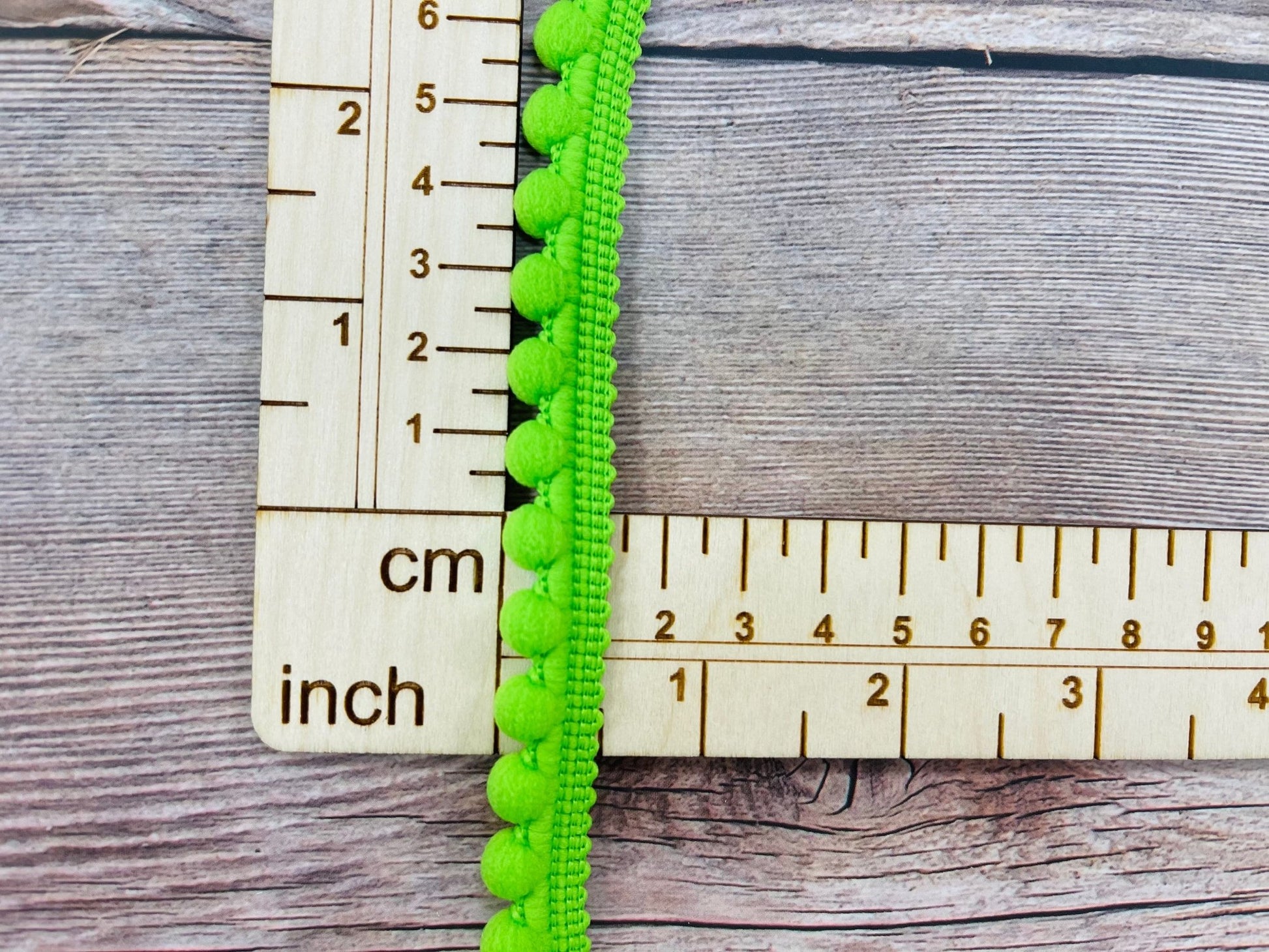 Ruban pompon 12 mm vert